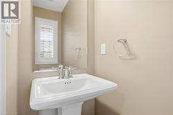 Main Floor powder room with pedestal sink - 