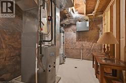 The property features visible HVAC and ductwork, exposed wooden ceiling joists, and framed wall studs - 