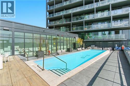3210 Dakota Common Unit# A814, Burlington, ON - Outdoor With In Ground Pool With Balcony
