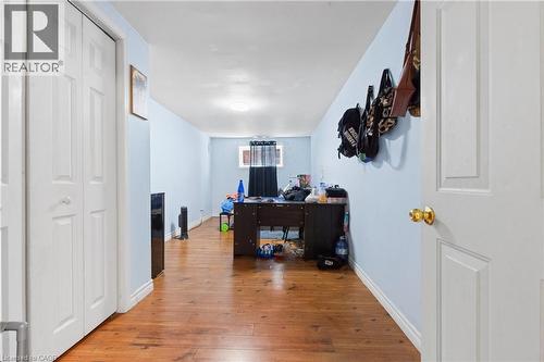 Office featuring light wood-style flooring and baseboards - 23 Amherst Drive, Kitchener, ON - Indoor