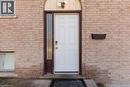 View of exterior entry with brick siding - 23 Amherst Drive, Kitchener, ON  - Outdoor With Exterior 