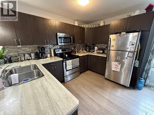 529 Alexandra Street, Weyburn, SK - Indoor Photo Showing Kitchen With Double Sink