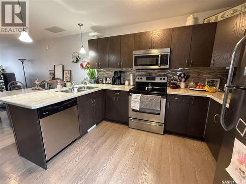 529 Alexandra Street, Weyburn, SK - Indoor Photo Showing Kitchen With Double Sink