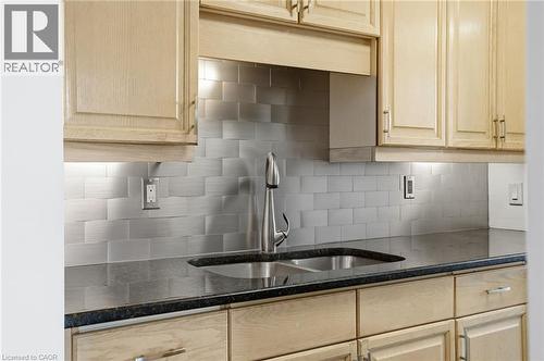 222 Jackson Street W Unit# 606, Hamilton, ON - Indoor Photo Showing Kitchen With Double Sink