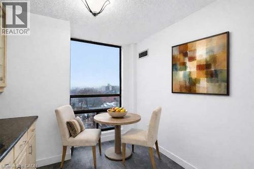 VIRTUALLY STAGED - 222 Jackson Street W Unit# 606, Hamilton, ON - Indoor Photo Showing Dining Room