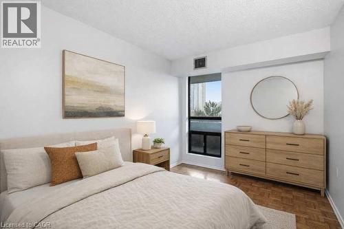 VIRTUALLY STAGED - 222 Jackson Street W Unit# 606, Hamilton, ON - Indoor Photo Showing Bedroom