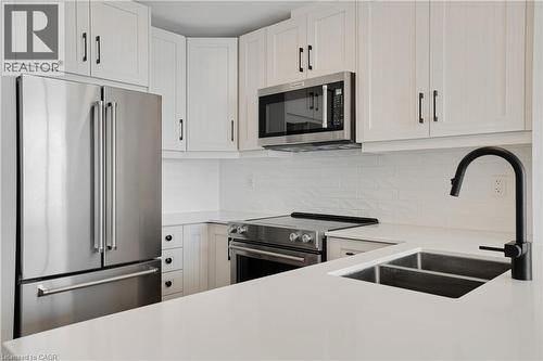 60 Charles Street W Unit# 1904, Kitchener, ON - Indoor Photo Showing Kitchen With Double Sink With Upgraded Kitchen