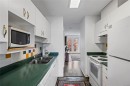 #4-668 Beach Rd, Qualicum Beach, BC  - Indoor Photo Showing Kitchen With Double Sink 