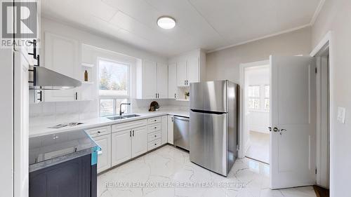 23 Marsh Road, Toronto, ON - Indoor Photo Showing Kitchen With Double Sink