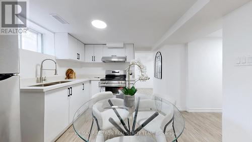 23 Marsh Road, Toronto, ON - Indoor Photo Showing Kitchen With Double Sink