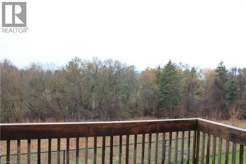 Outdoor wooden deck featuring a natural wood railing - 40 Compass Trail, Cambridge, ON - Outdoor
