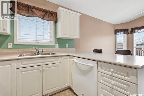 106 Lashyn Cove, Saskatoon, SK - Indoor Photo Showing Kitchen With Double Sink
