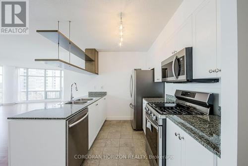 609 - 10 Navy Wharf Court, Toronto, ON - Indoor Photo Showing Kitchen With Stainless Steel Kitchen With Double Sink With Upgraded Kitchen