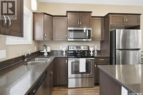1216 Pringle Way, Saskatoon, SK - Indoor Photo Showing Kitchen With Double Sink