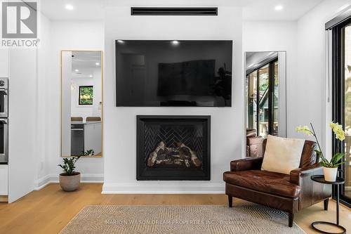 123 Mason Terrace, Ottawa, ON - Indoor Photo Showing Living Room With Fireplace