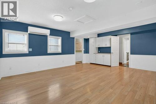 The garage is currently set up as a Family Room complete with separate heating and separate entrance. - 54 Deerwood Crescent, Kitchener, ON - Indoor Photo Showing Other Room