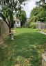 Large backyard with pond, shed and vegetable garden area - 725 Paris Boulevard, Waterloo, ON  - Outdoor 