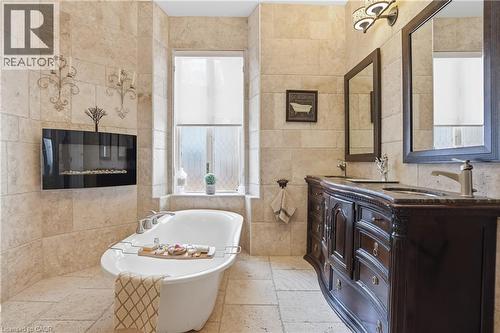 26 Ravenscliffe Avenue, Hamilton, ON - Indoor Photo Showing Bathroom With Fireplace