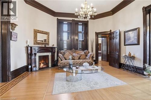 26 Ravenscliffe Avenue, Hamilton, ON - Indoor Photo Showing Living Room With Fireplace