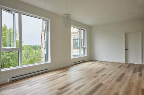 Overall view - 202-100 Rue De L'Hibiscus, Granby, QC - Indoor Photo Showing Other Room