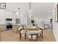 Virtually enhanced - dining room & kitchen - 