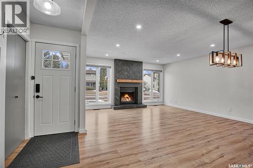226 Candle Crescent, Saskatoon, SK - Indoor With Fireplace