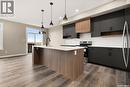 315 Veterans Drive, Warman, SK  - Indoor Photo Showing Kitchen With Upgraded Kitchen 
