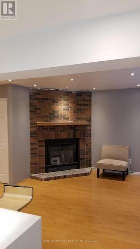 487 Wallenberg Crescent, Mississauga, ON - Indoor Photo Showing Living Room With Fireplace