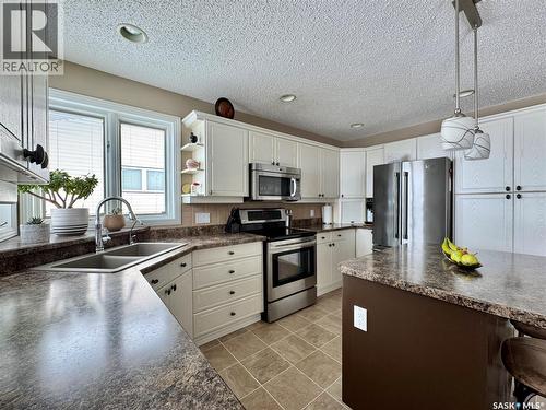 140 Morrison Drive, Yorkton, SK - Indoor Photo Showing Kitchen With Double Sink