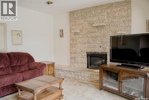 802 7Th Street E, Saskatoon, SK - Indoor Photo Showing Living Room With Fireplace