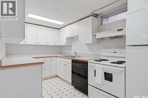 56 Welker Crescent, Saskatoon, SK - Indoor Photo Showing Kitchen With Double Sink