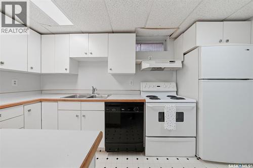 56 Welker Crescent, Saskatoon, SK - Indoor Photo Showing Kitchen With Double Sink