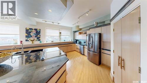 400 1150 Rose Street, Regina, SK - Indoor Photo Showing Kitchen With Stainless Steel Kitchen