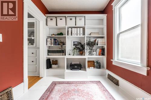 215 27Th Street W, Saskatoon, SK - Indoor Photo Showing Other Room With Fireplace
