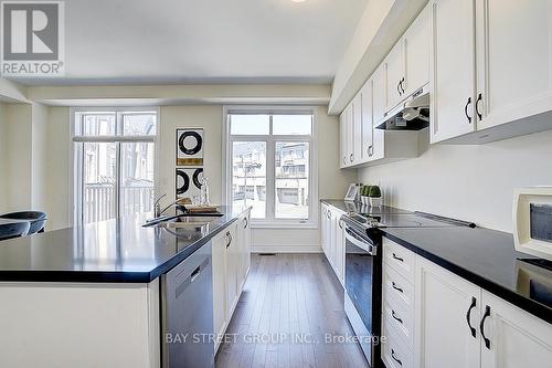 34 Phillipsen Way, Markham, ON - Indoor Photo Showing Kitchen With Double Sink With Upgraded Kitchen