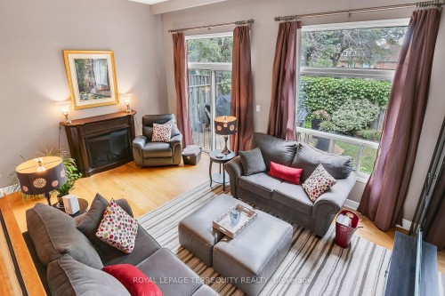 74 Silver Shadow Path, Toronto, ON - Indoor Photo Showing Living Room With Fireplace