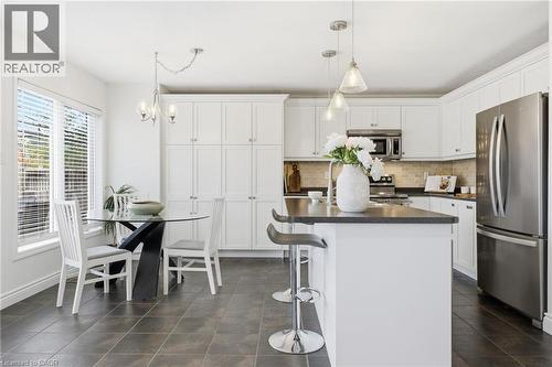 910 Vickerman Way, Milton, ON - Indoor Photo Showing Kitchen With Upgraded Kitchen