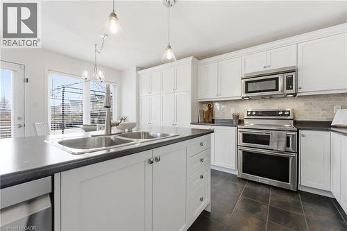 910 Vickerman Way, Milton, ON - Indoor Photo Showing Kitchen With Double Sink