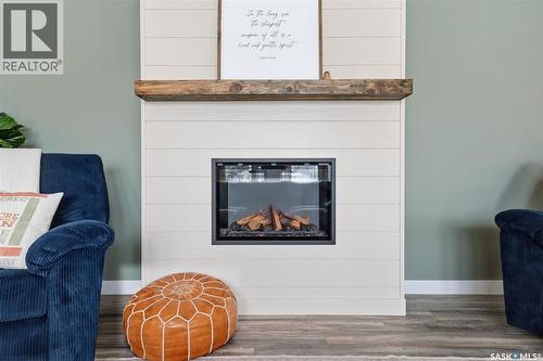 217 13Th Avenue E, Watrous, SK - Indoor Photo Showing Other Room With Fireplace