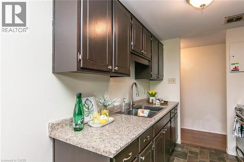 30 Avalon Place Unit# 203, Kitchener, ON - Indoor Photo Showing Kitchen With Double Sink