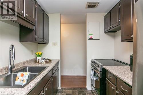 30 Avalon Place Unit# 203, Kitchener, ON - Indoor Photo Showing Kitchen With Double Sink