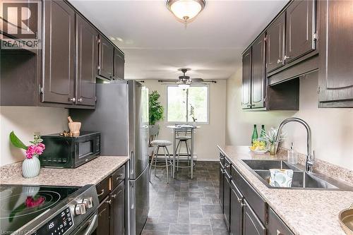 30 Avalon Place Unit# 203, Kitchener, ON - Indoor Photo Showing Kitchen With Double Sink With Upgraded Kitchen