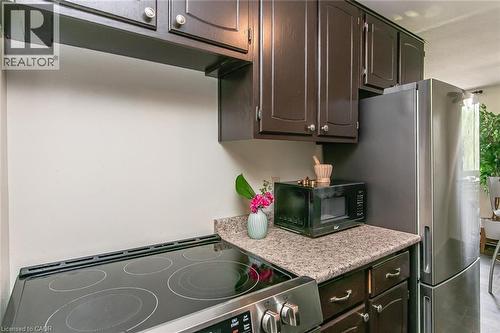 30 Avalon Place Unit# 203, Kitchener, ON - Indoor Photo Showing Kitchen