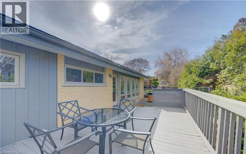 Outdoor deck area with painted wooden railing and a section of lattice - 400 Manchester Road, Kitchener, ON - Outdoor With Exterior