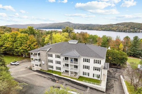 Façade - 8-977 Ch. Massawippi, North Hatley, QC - Outdoor With Body Of Water With View