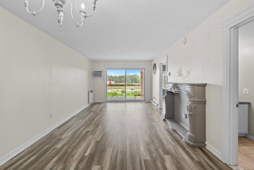 Living Room - 305-485 Rue Rochon, Saint-Jérôme, QC - Indoor Photo Showing Other Room