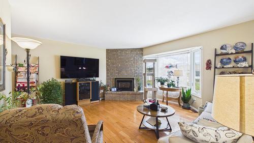 2220 3A Street, Cranbrook, BC - Indoor Photo Showing Living Room With Fireplace