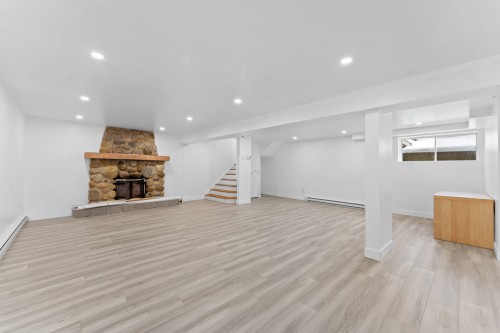 Salle familiale - 4 Rue Lambert, Repentigny (Repentigny), QC - Indoor With Fireplace