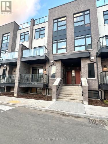 110 - 1593 Rose Way, Milton, ON - Outdoor With Balcony With Facade