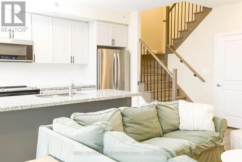110 - 1593 Rose Way, Milton, ON - Indoor